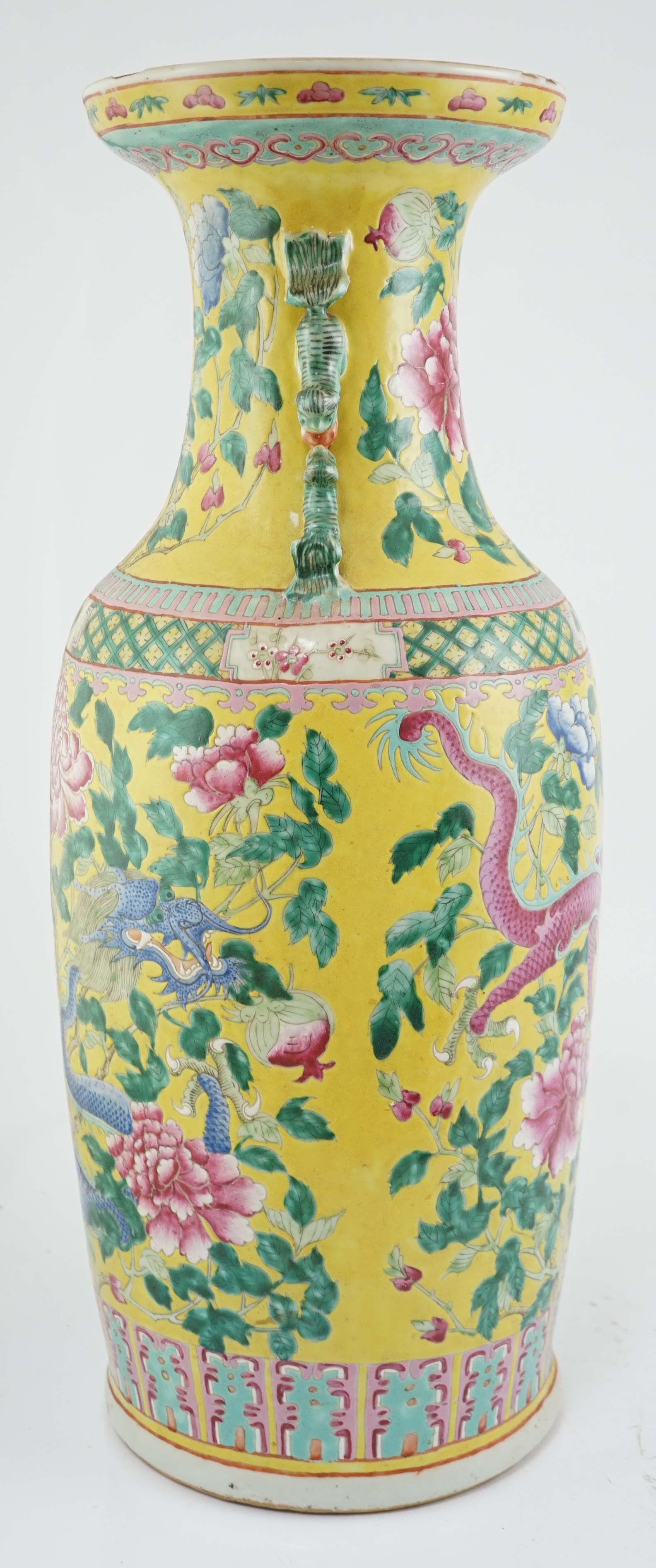 A tall Chinese Straits yellow ground ‘dragon’ vase, 19th century, rim chips